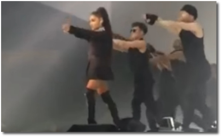 Ariana pointing and aiming during Be Alright on tour