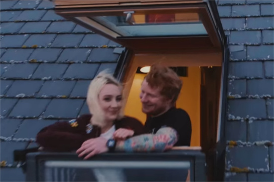 Ed Sheeran with Saoirse Rohan and a slanty sloping roof in Galway Girl